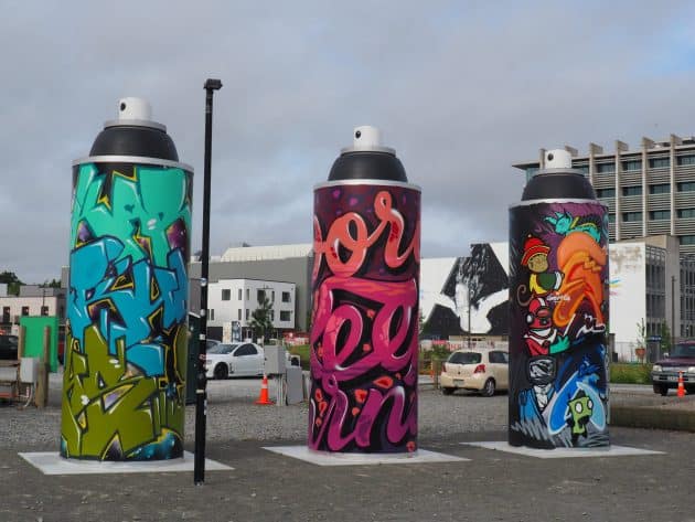 These giant Aerosol cans are part of a group of eight for street artists to